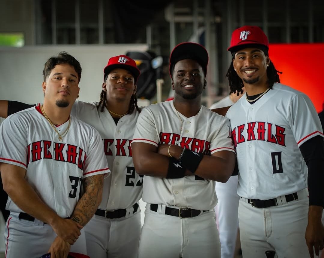 Jakobi with three New Jersey Jackals teammates in the dugout